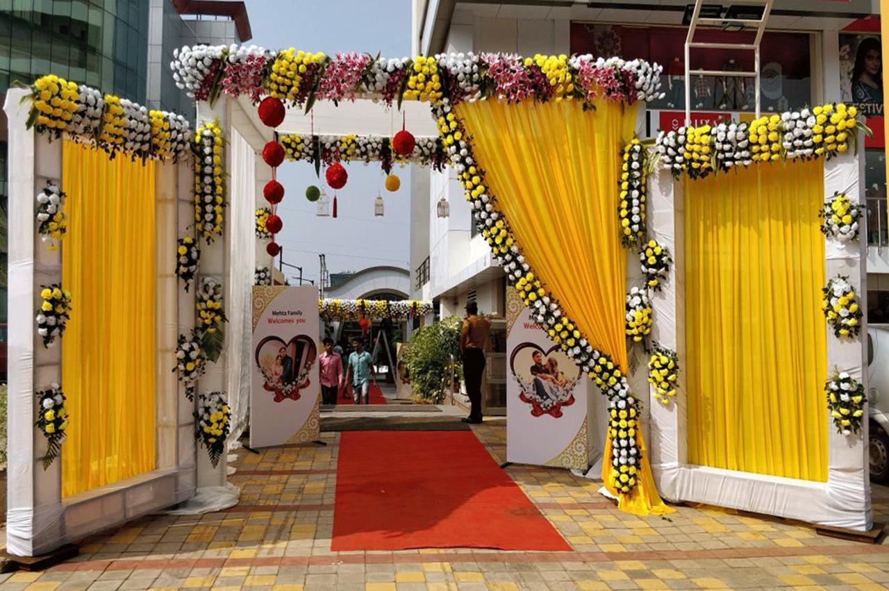 Festive marigold door toran decoration by Akash Flower Decoration